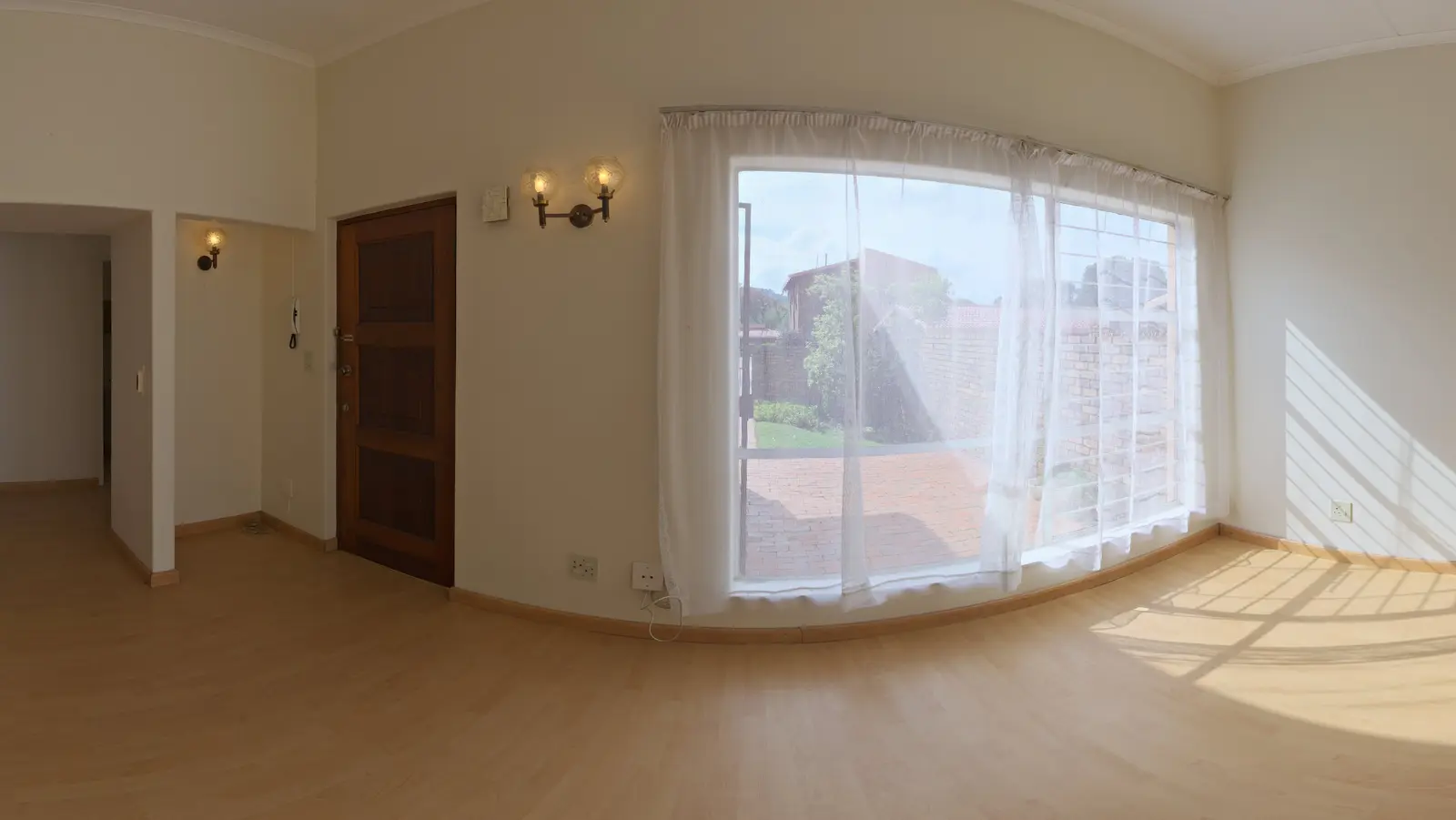 An empty, sunlit rental unit, ready for a 3D walkthrough